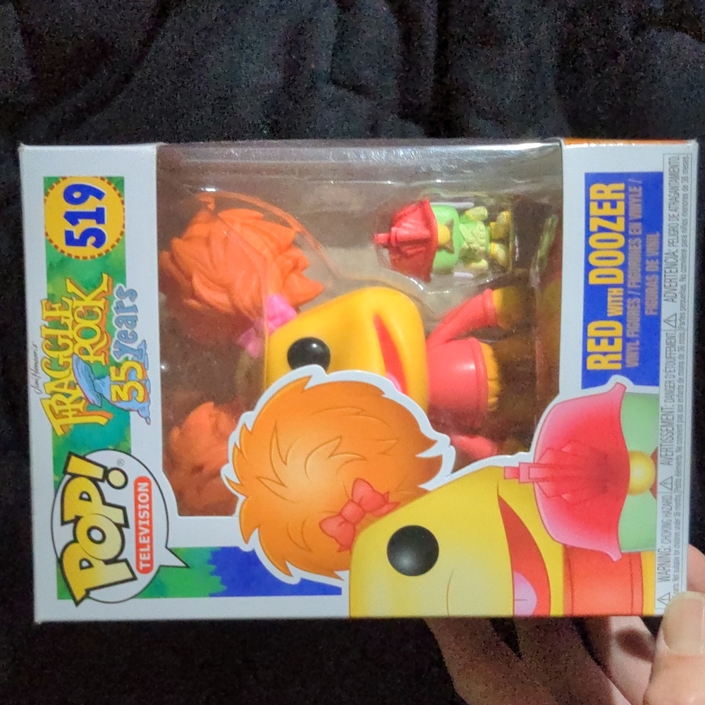 Red with doozer pop Funko doll fragile rock